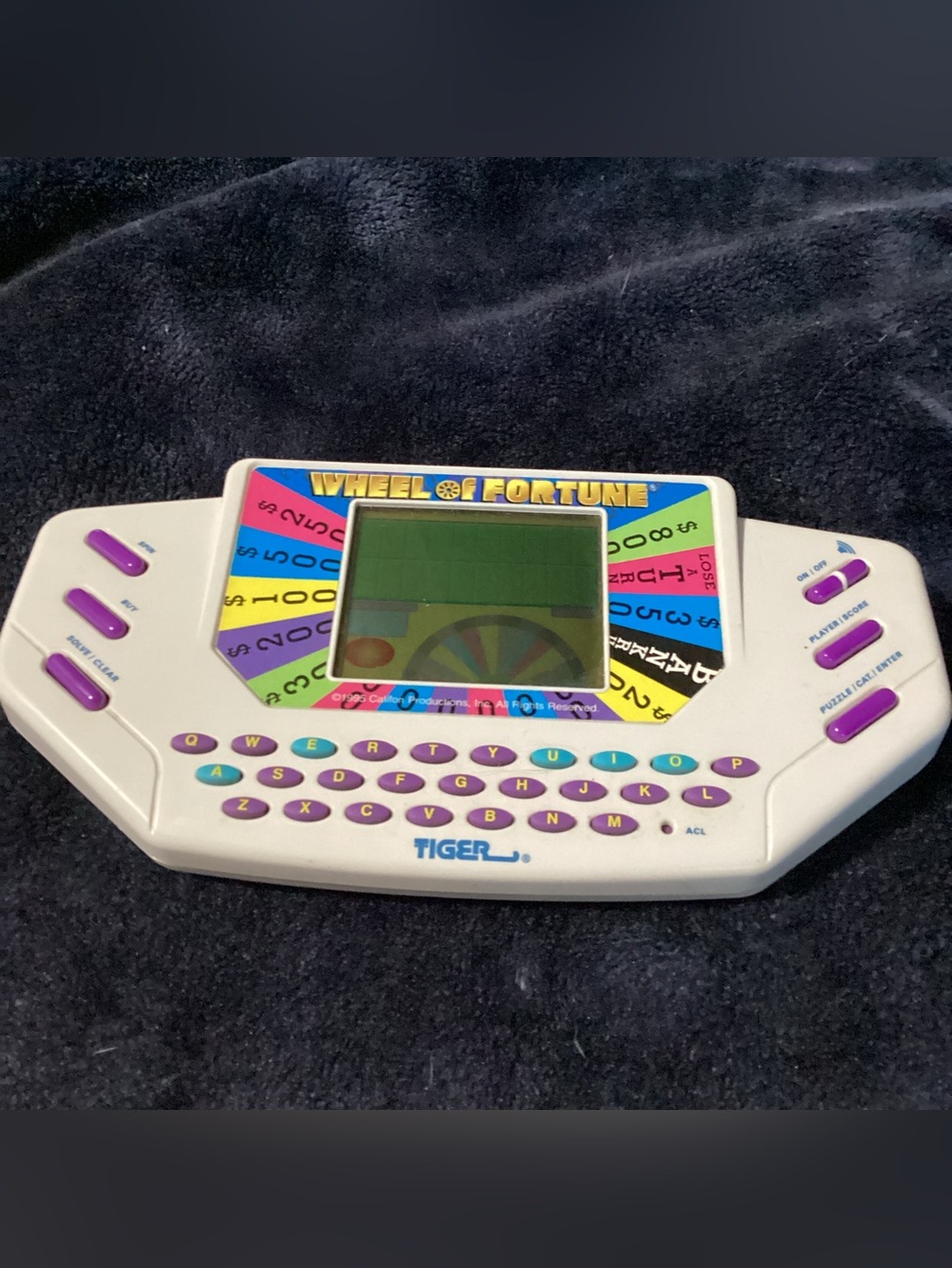 Vintage  Wheel of Fortune Handheld LCD Game Tiger Electronics 1995 Tested